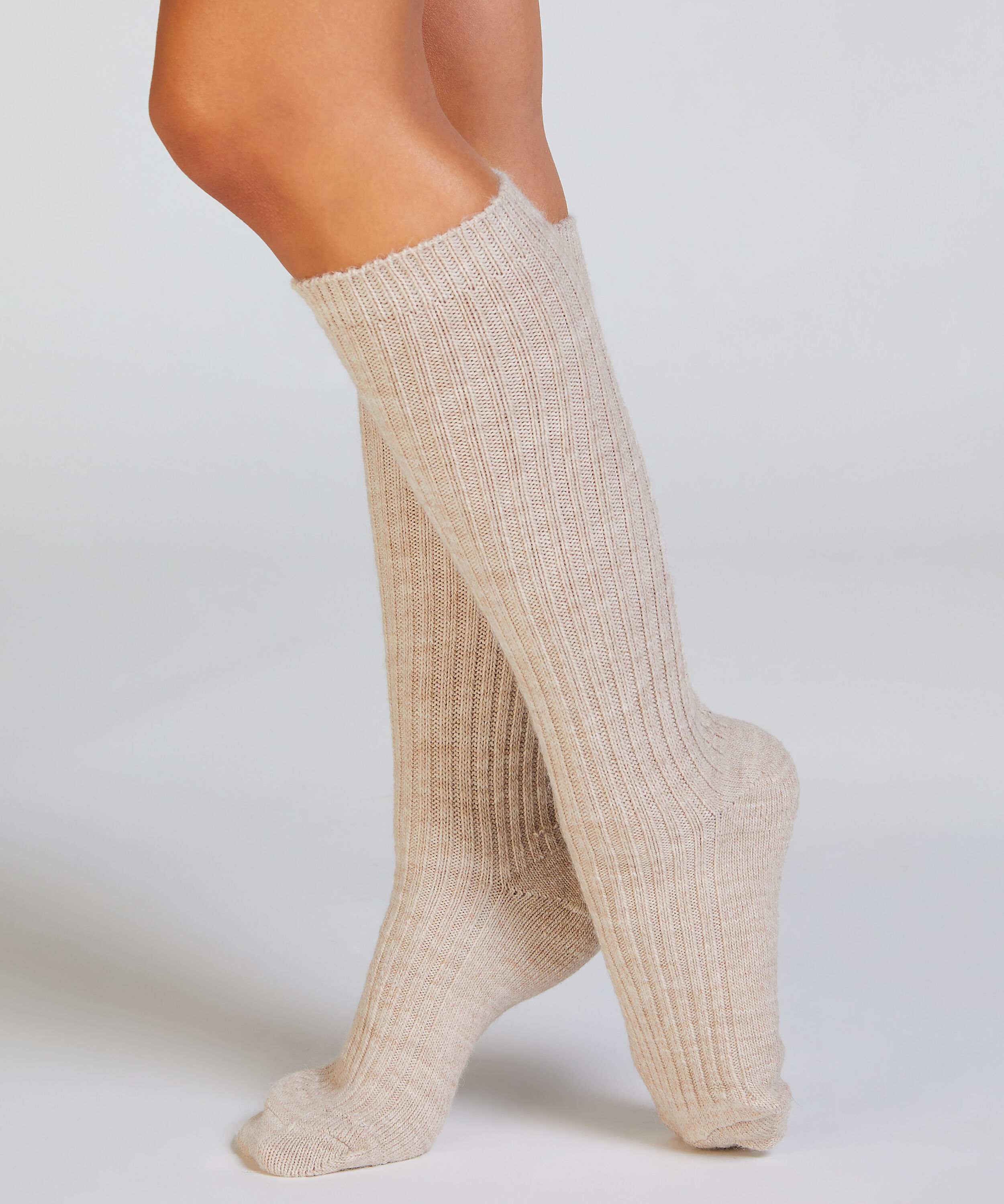 1 par stickade strumpor, Beige