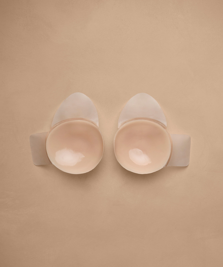 Sj&auml;lvh&auml;ftande kupor som lyfter, Beige