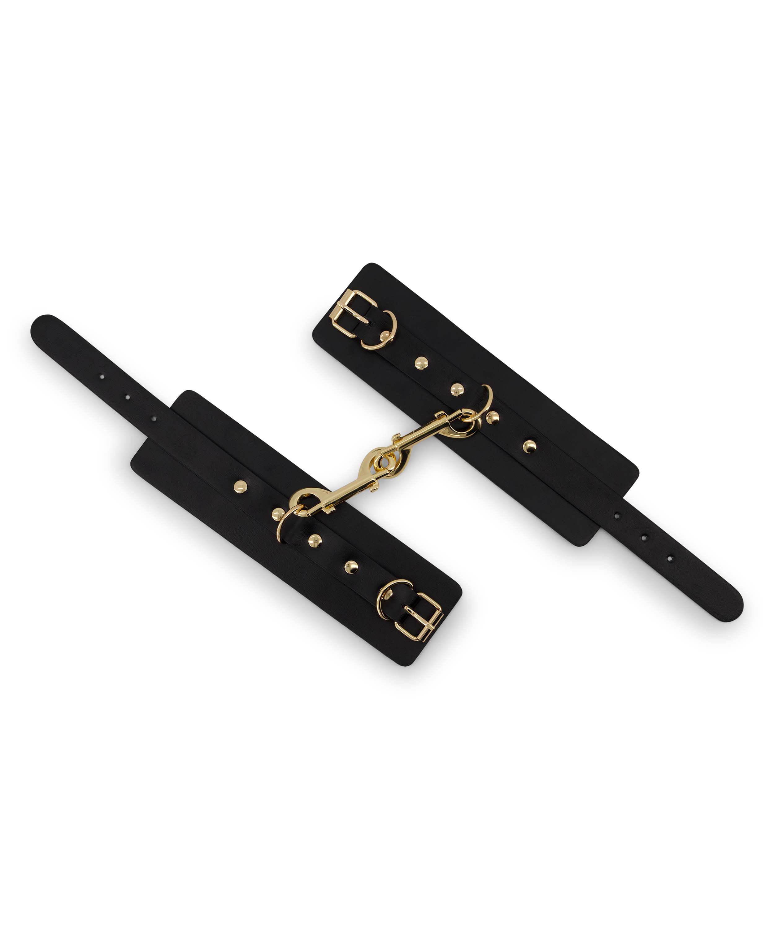 Handledsmanschetter med metallnitar, Svart