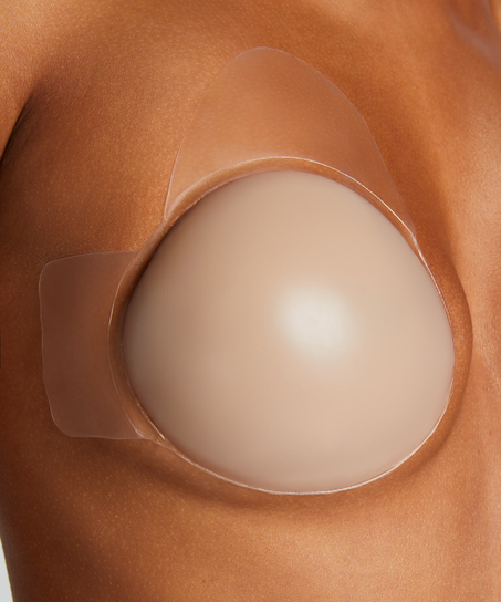 Sj&auml;lvh&auml;ftande kupor som lyfter, Beige