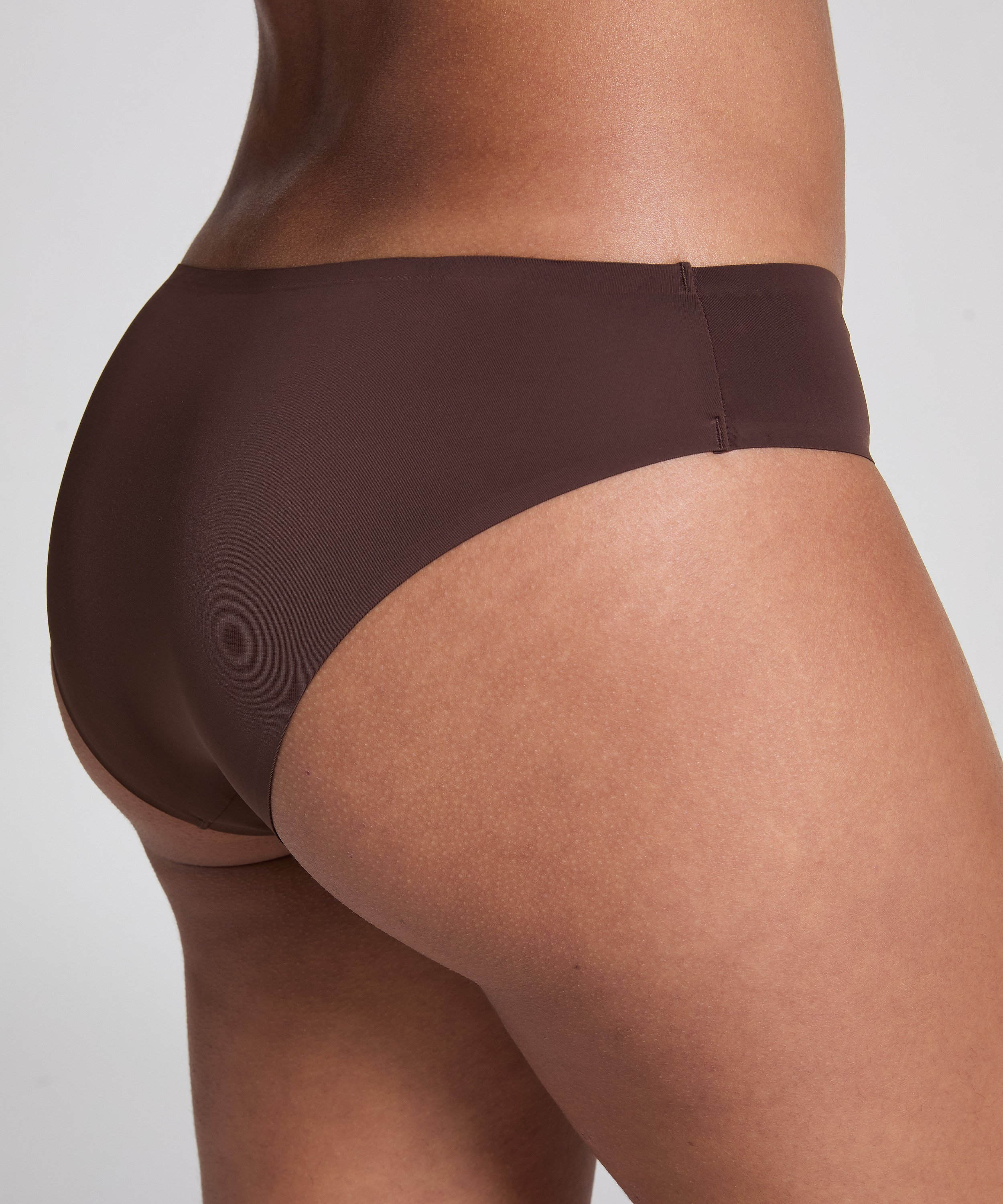 Osynlig brazilian-trosa, Brun, main